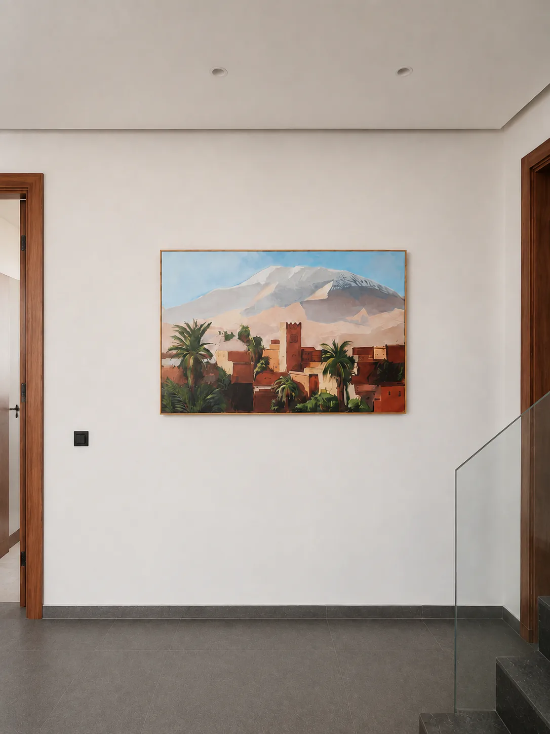 Peinture Atlas installée sur un mur clair au sommet de l’escalier